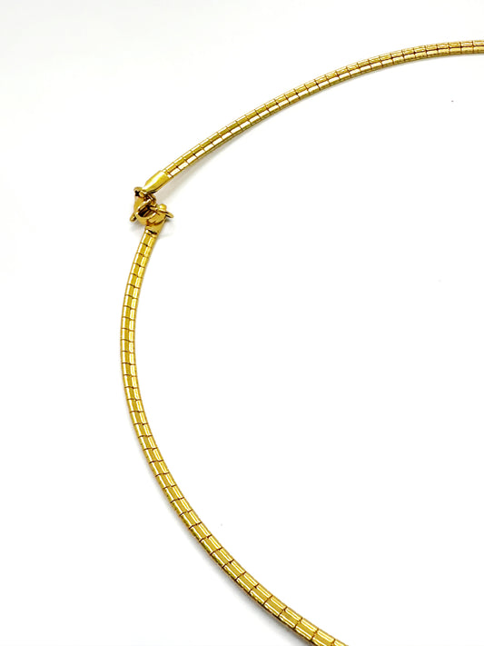 Close-up of the secure clasp of the snake chain necklace