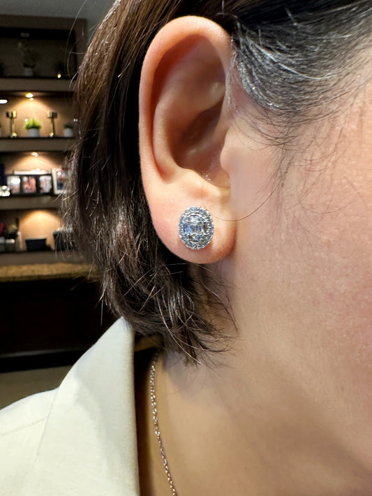 Side profile of earring highlighting its size and diamond-like appearance