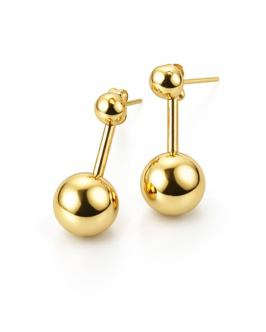 Gold stainless steel double sphere front-back earrings with polished bead design on white background