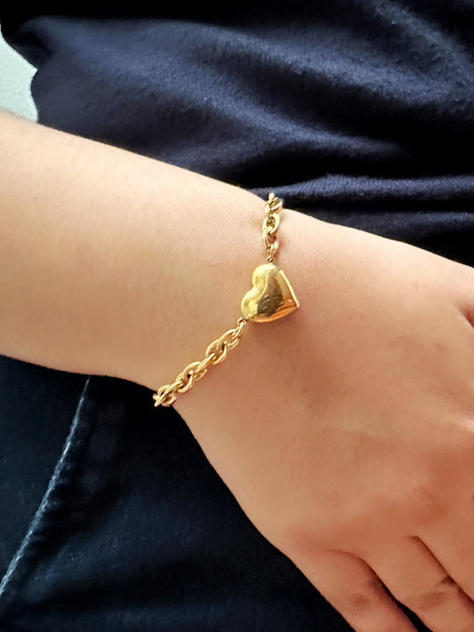 Heart chain bracelet worn on wrist – non-tarnish 18k gold-plated jewelry