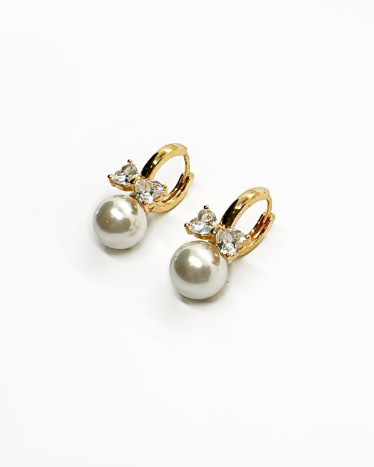 Pearl Bow Huggie Earrings – 18K Gold Dipped | Premium Zirconia