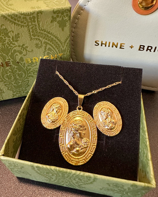 Gold medallion necklace and matching earrings with Greco-Roman profile design in a green Shine Bright PH gift box with branded pouch