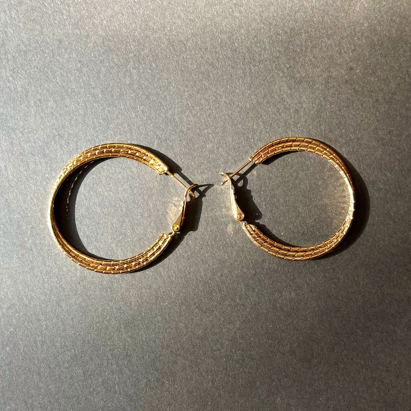 Tootsie Roll Hoop Earrings in Gold Tone