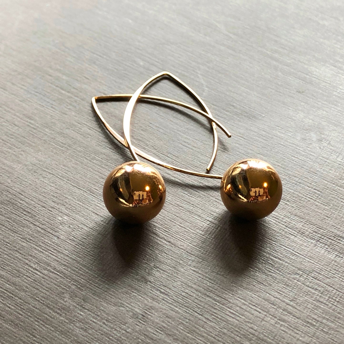 Solid Sphere Cat Ear Needle Drop Earrings in Gold Tone