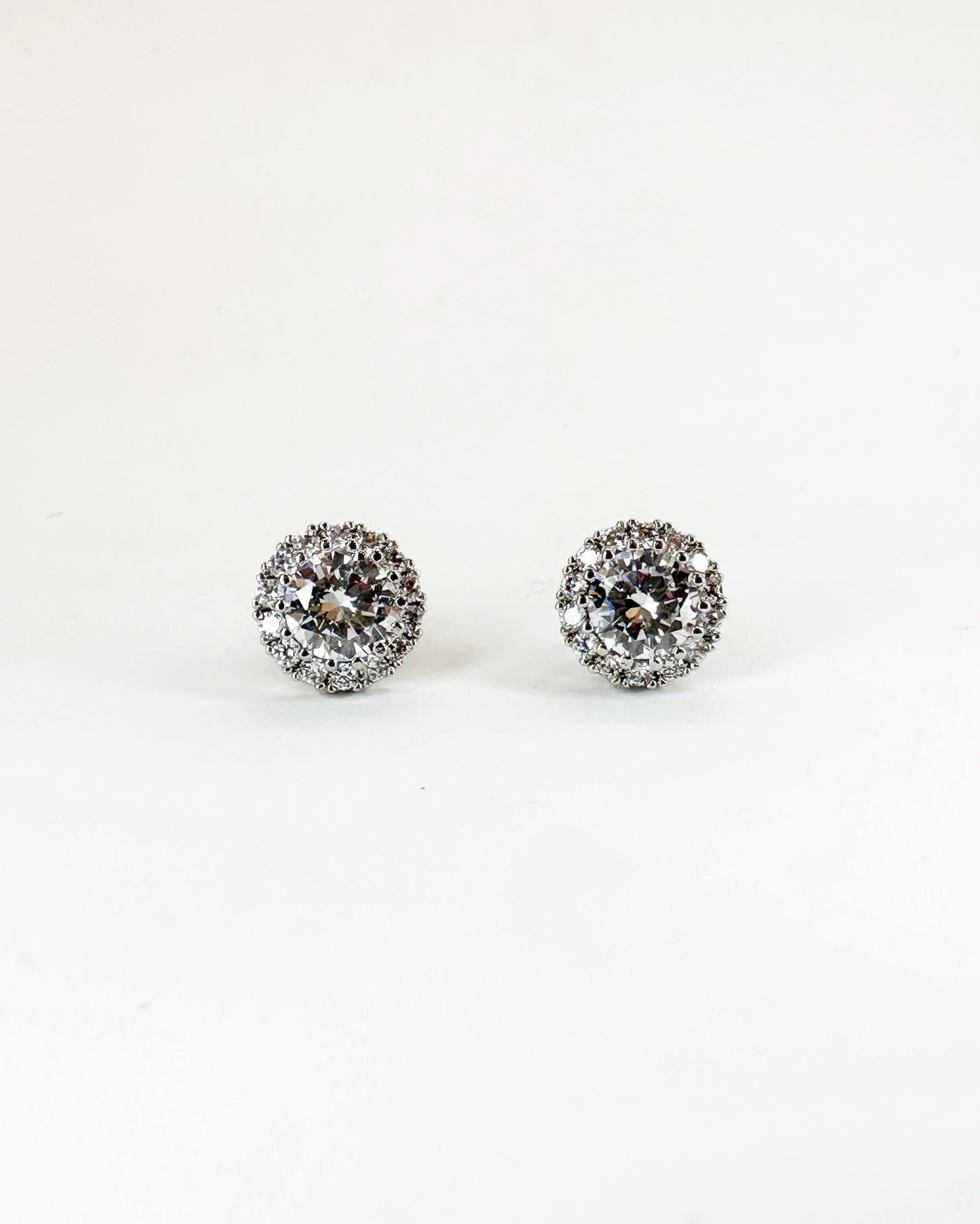 Classic halo round stud earrings with premium zirconia in 14K white gold-dipped finish