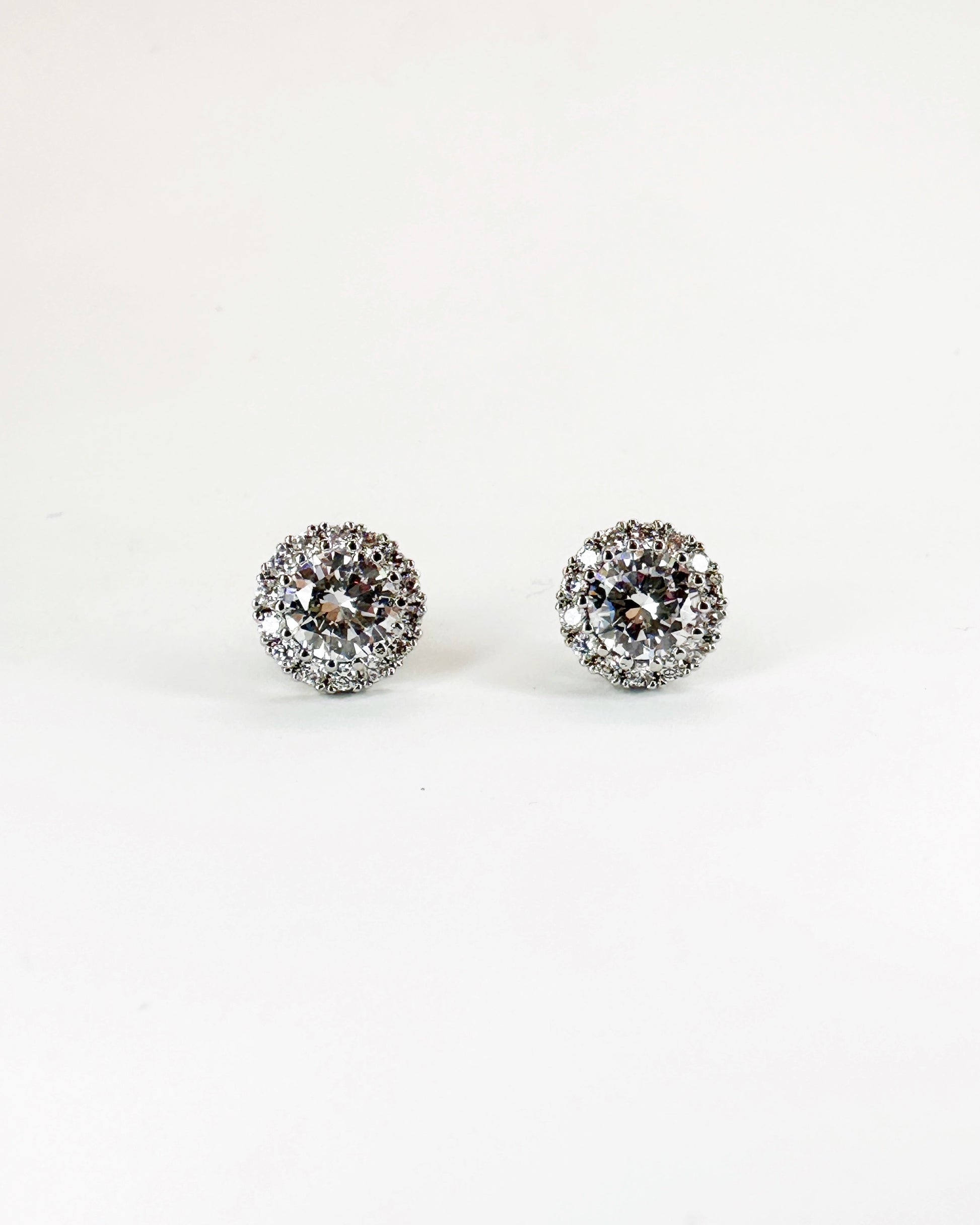 Classic halo round stud earrings with premium zirconia in 14K white gold-dipped finish