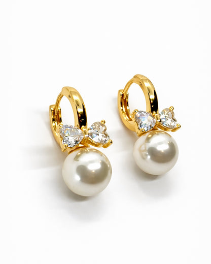 Pearl Bow Huggie Earrings – 18K Gold Dipped | Premium Zirconia