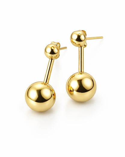 Gold stainless steel double sphere front-back earrings with polished bead design on white background