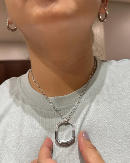 Model wearing oval link zirconia pendant necklace showing real-life size and fit