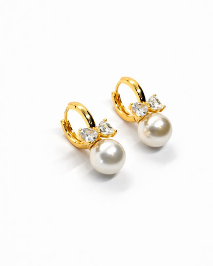 Pearl Bow Huggie Earrings – 18K Gold Dipped | Premium Zirconia
