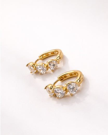 Trinity Heart Zirconia Huggie Earrings – 14K Gold Tone