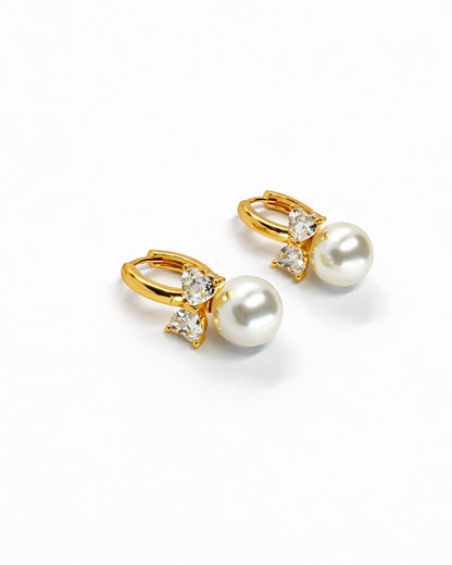 Pearl Bow Huggie Earrings – 18K Gold Dipped | Premium Zirconia