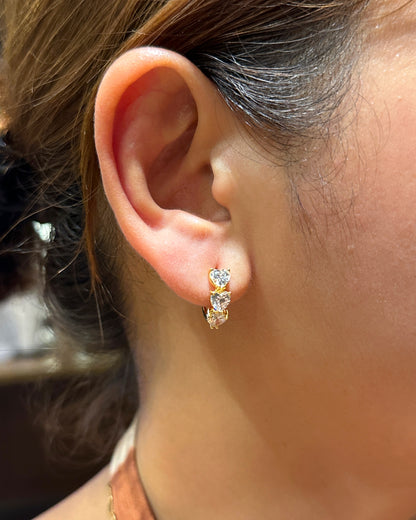 Trinity Heart Zirconia Huggie Earrings – 14K Gold Tone