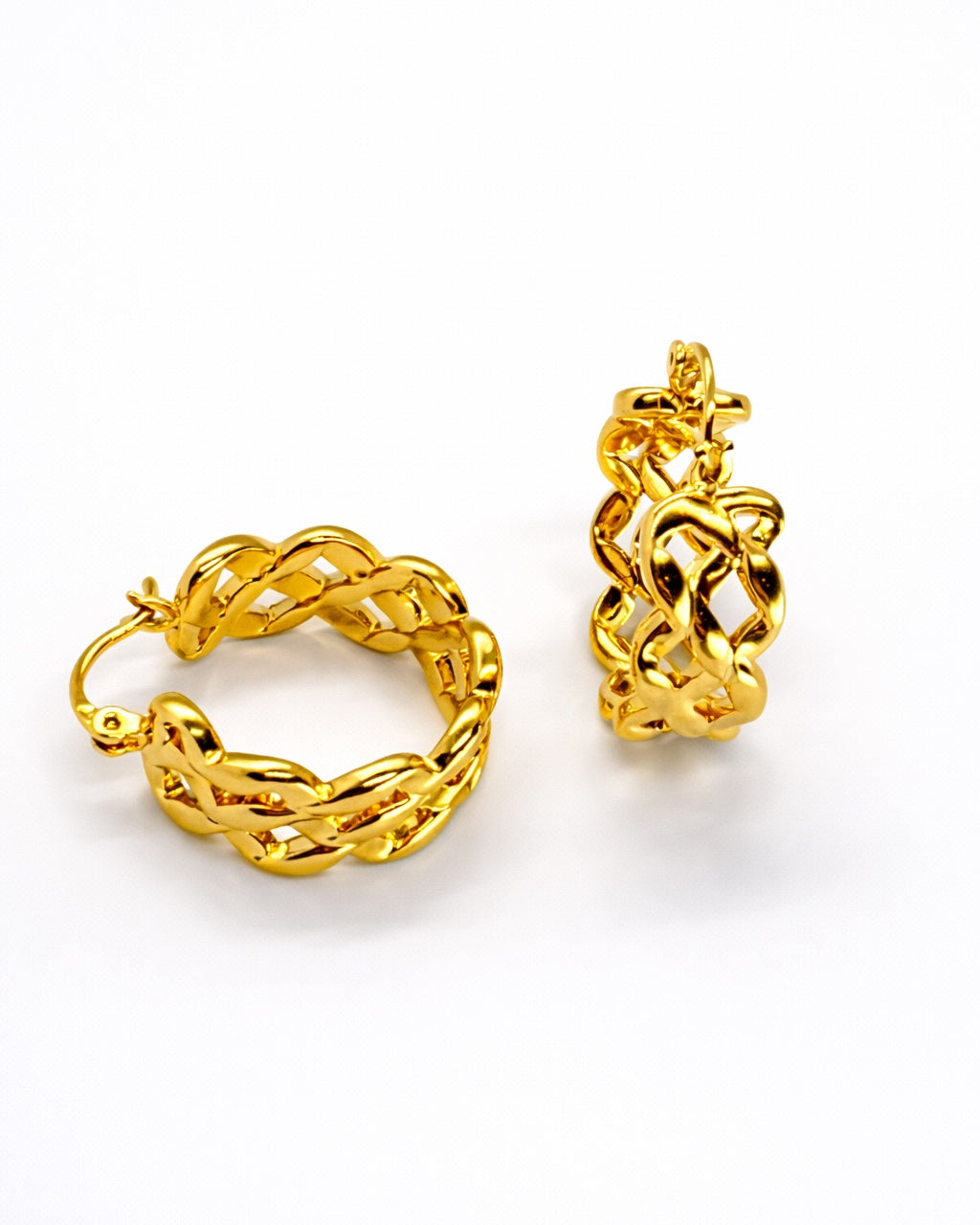 Macro view of the basket weave texture, highlighting the high-polish gold finish and deep-etched design.