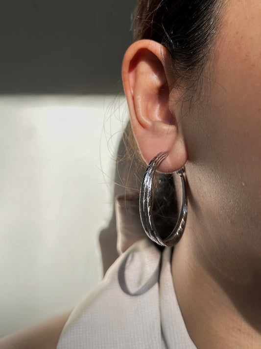 The Intreccio Hoops in White Gold Tone