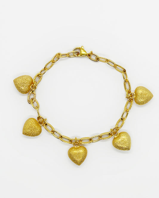 Frosted heart charm link bracelet in 18K gold-dipped stainless steel on white background