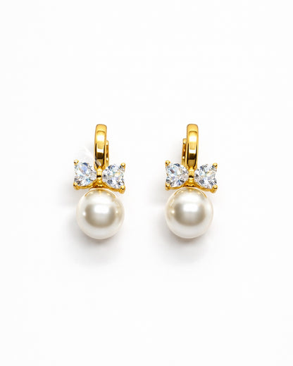 Pearl Bow Huggie Earrings – 18K Gold Dipped | Premium Zirconia