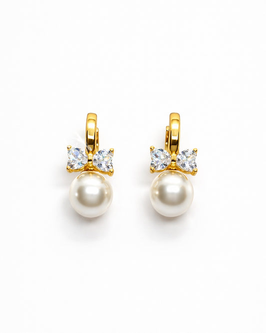 Pearl Bow Huggie Earrings – 18K Gold Dipped | Premium Zirconia