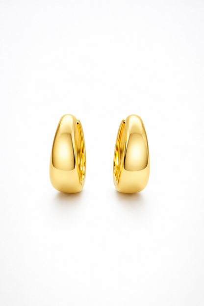 The Cashew Huggie Hoop Earrings in Gold Tone