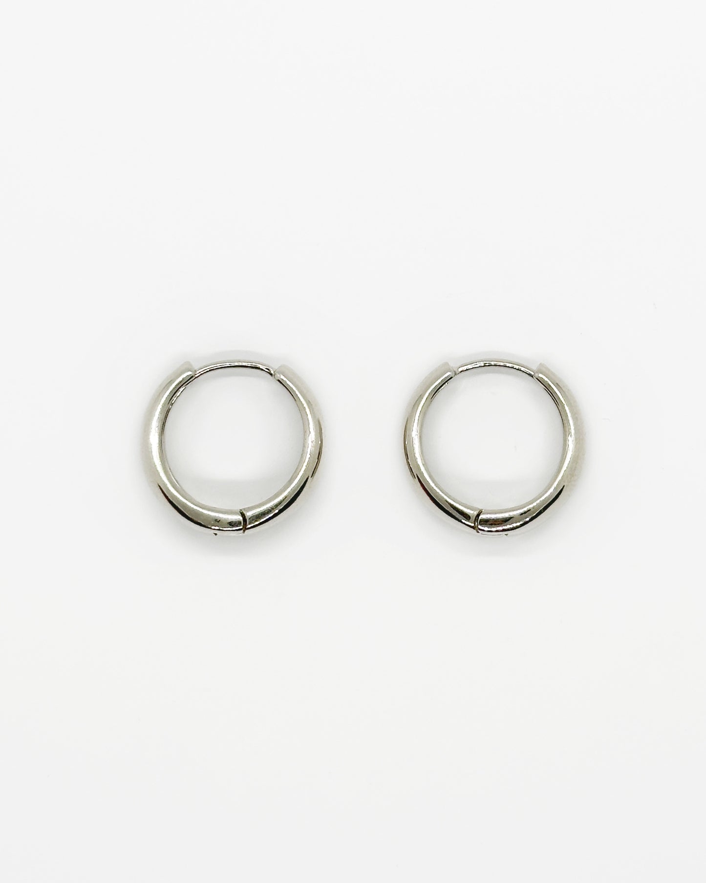 Cashew huggie earrings in 18K white gold dipped silver-tone finish