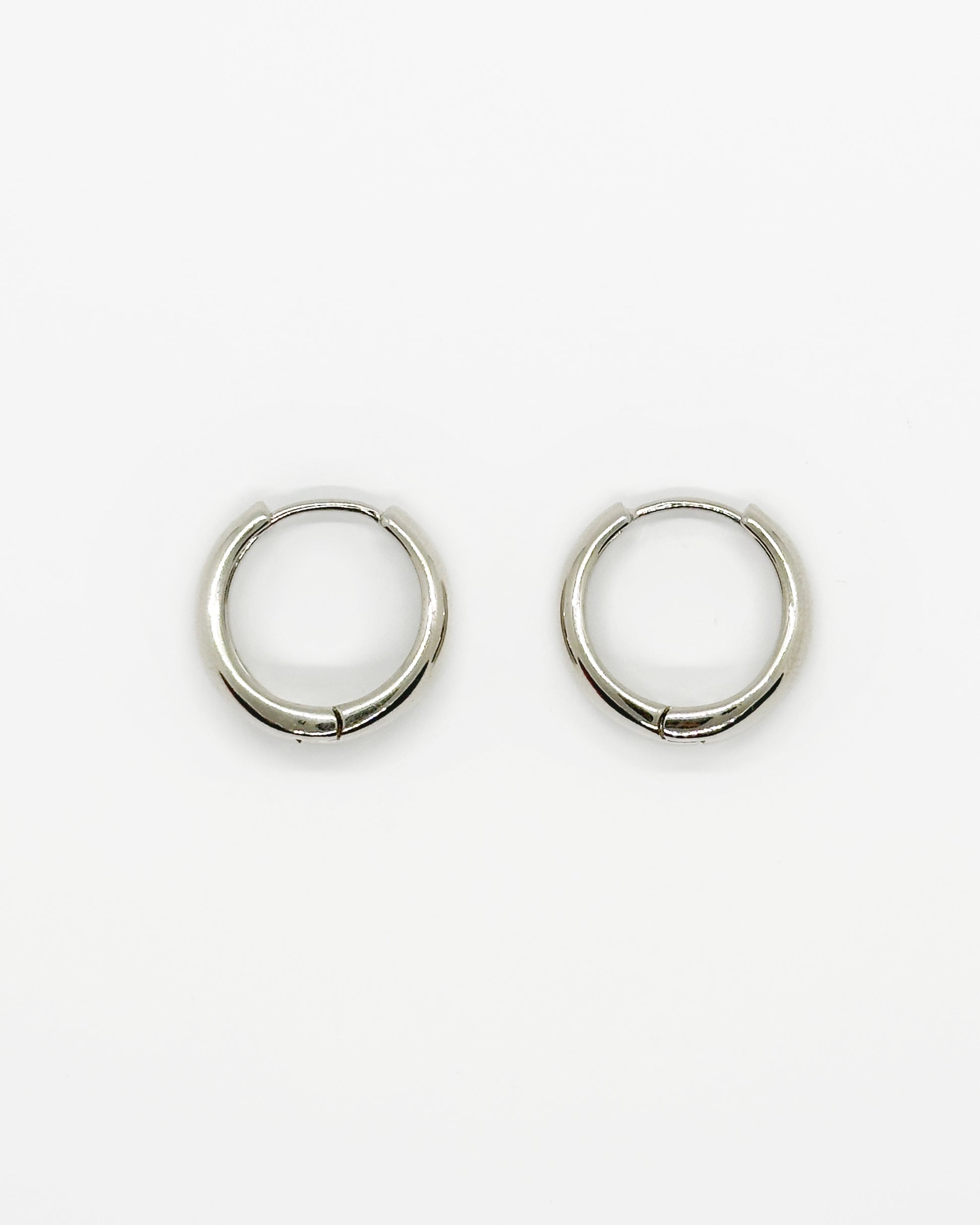 Cashew huggie earrings in 18K white gold dipped silver-tone finish