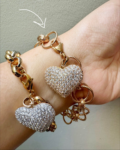 Model wearing the Vintage Heart Link Charm Bracelet on her wrist.
