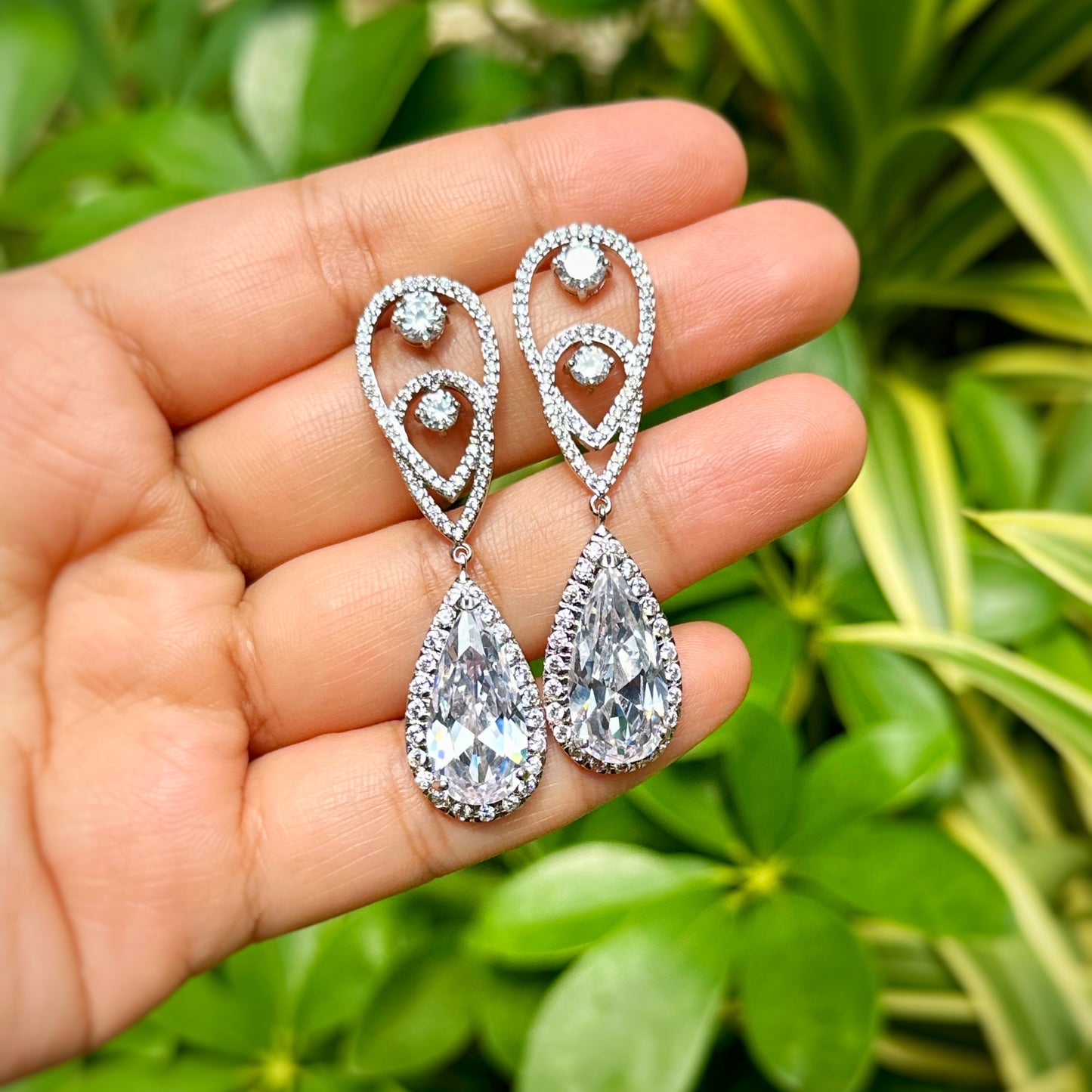 Radiant Teardrop Infinity Dangle Earrings