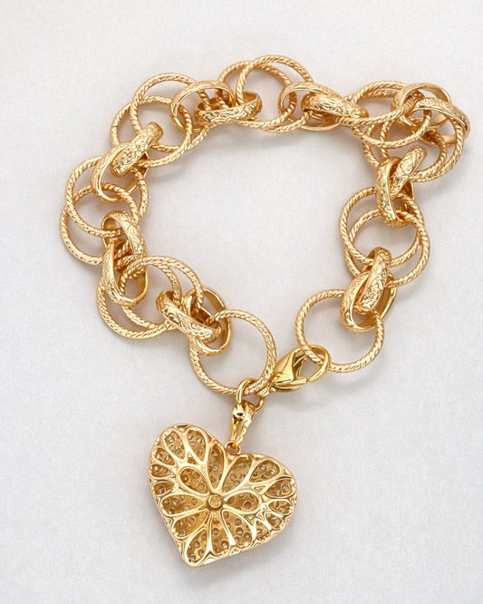 Close-up of pavé heart links showing the 14K gold with rose gold finish.