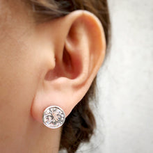 Load image into Gallery viewer, worn round bezel cut stud earrings in whitegold tone size 10mm 
