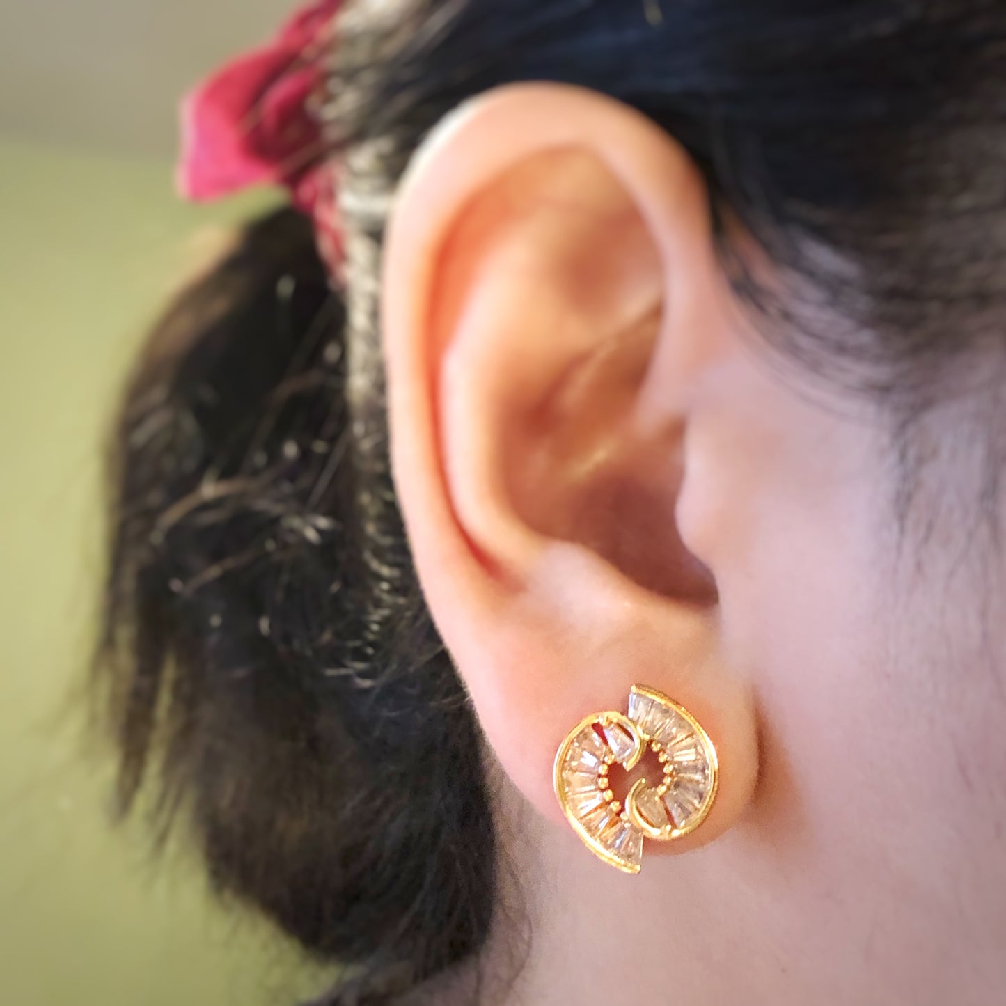 Cochlea Earrings in Gold Tone