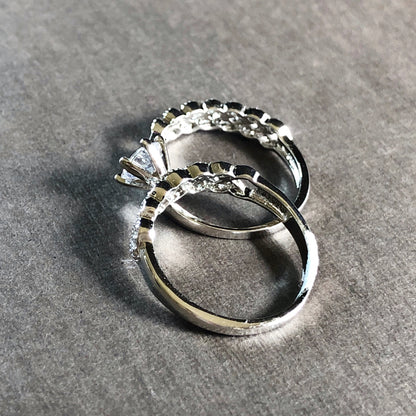 Rear view of ring prongs and band details showing CZ sparkle