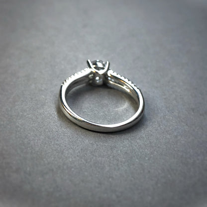 Radiant Round-Cut Solitaire Pavé Ring