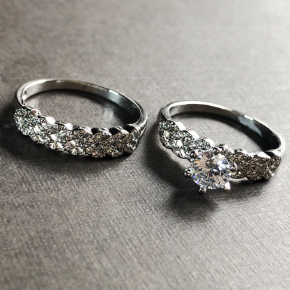 Interlocked rings stacked with visible braided pavé setting