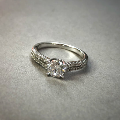Radiant Round-Cut Solitaire Pavé Ring