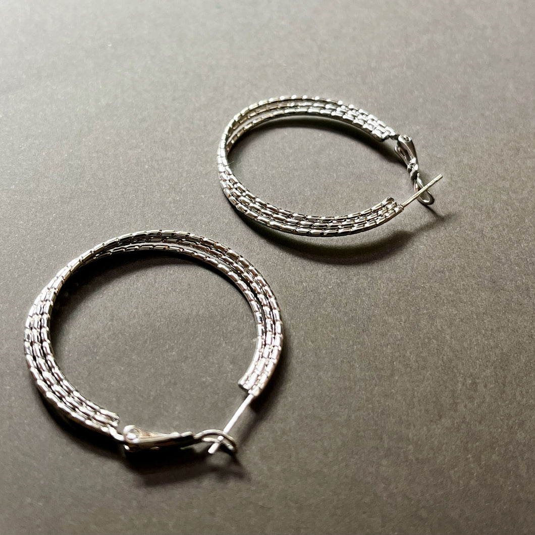 Tootsie Roll Hoops in Whitegold Tone